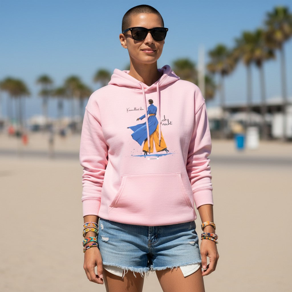 Frau trägt hellrosa HOOKamSEE Hoodie Karma klärt das Ich nicht am Strand